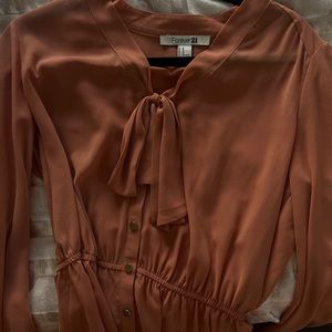 Peach colored blouse